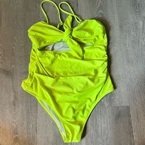 Neon yellow one piece swimsuit with cutout